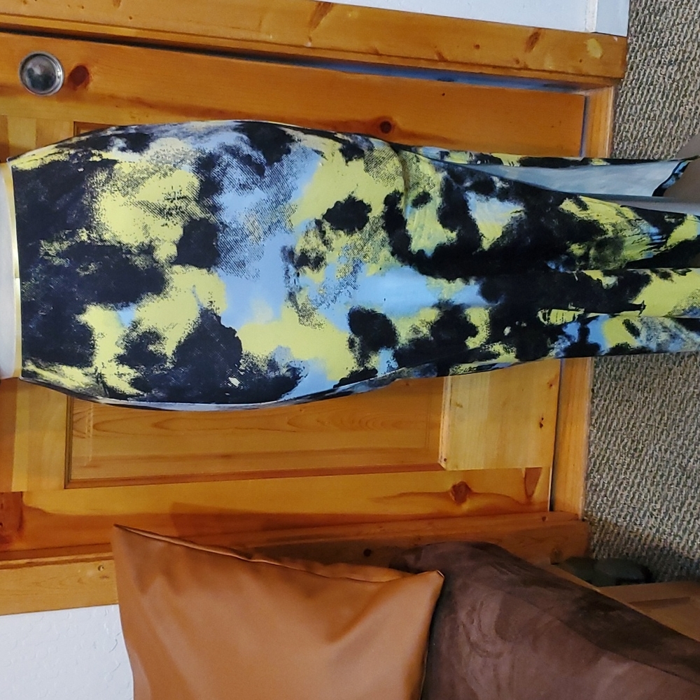 Brand new blue, neon green & black long maxi skirt with side slit. Size Small.